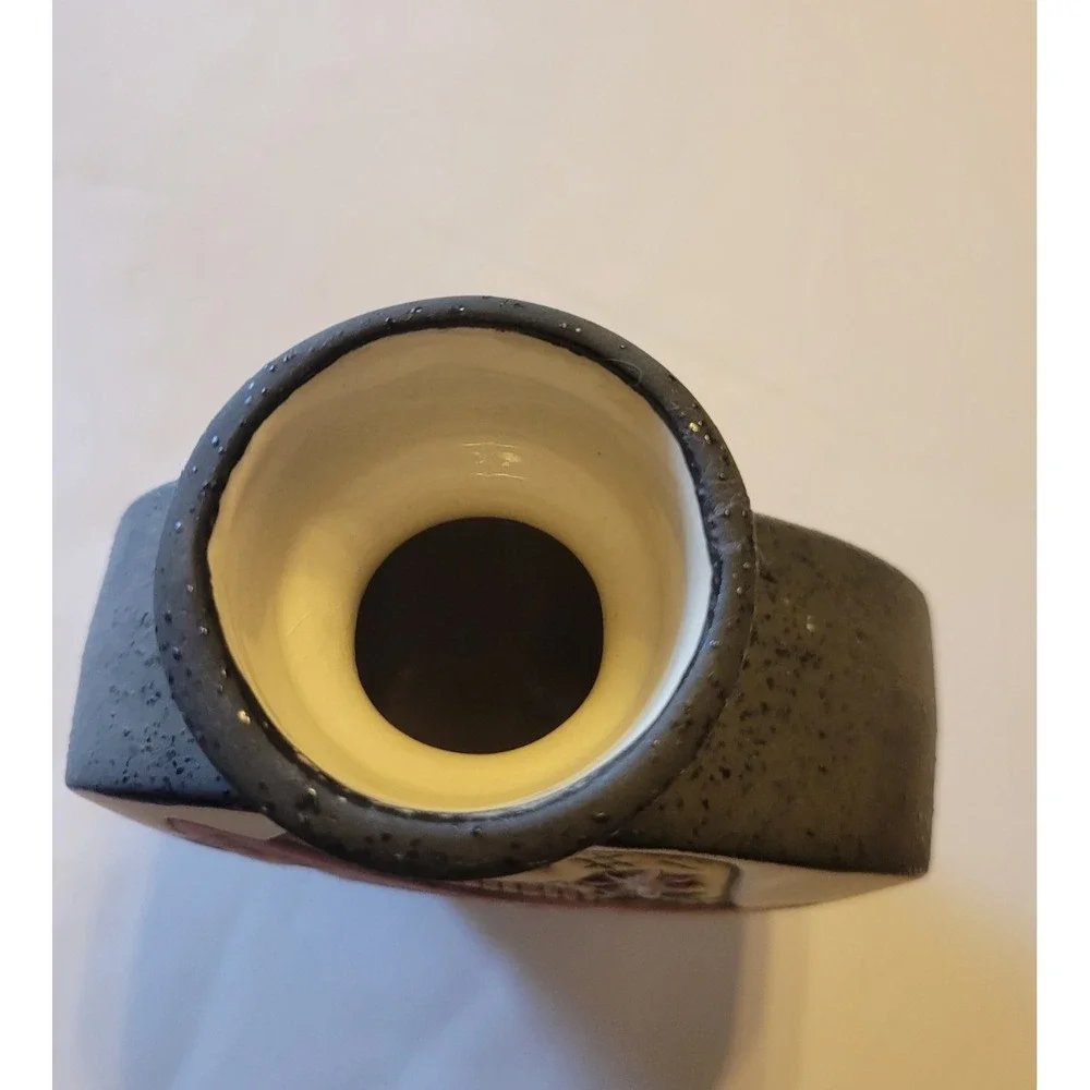 Handmade ceramic sad